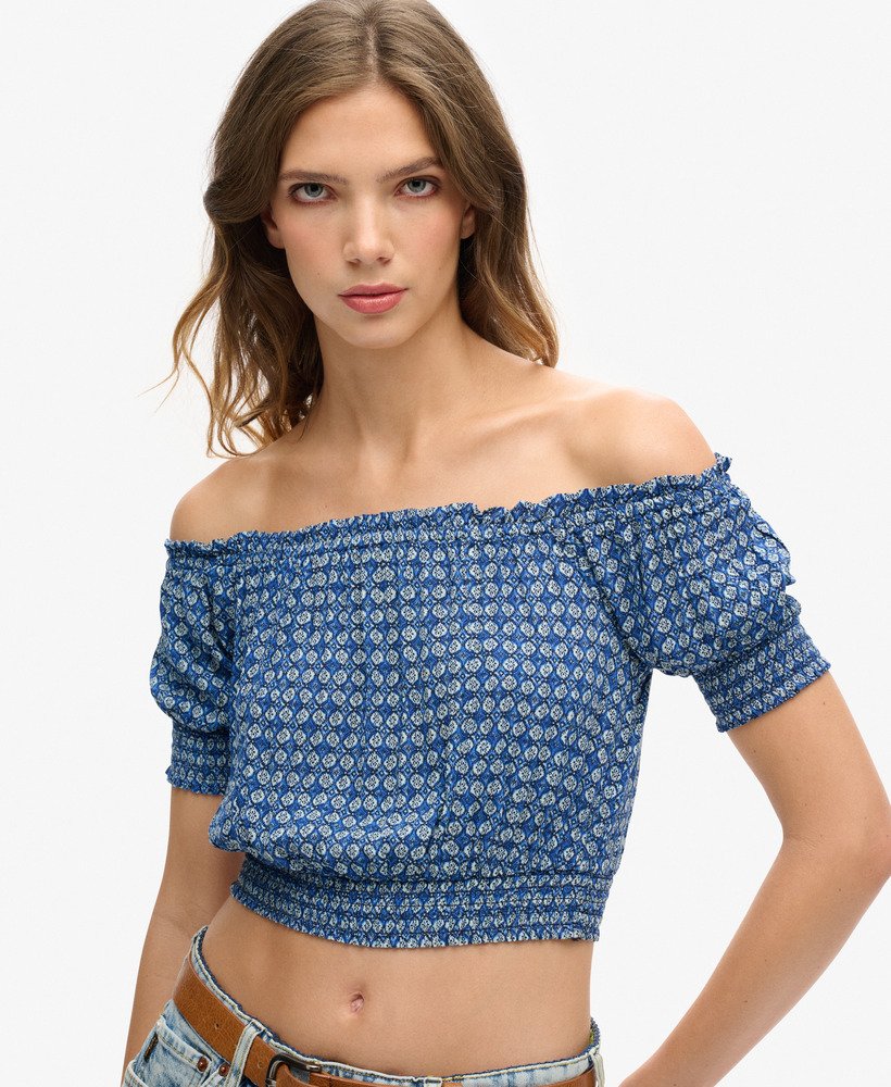 top cropped de manga curta com detalhe franzido em estampa geométrica mini azul.