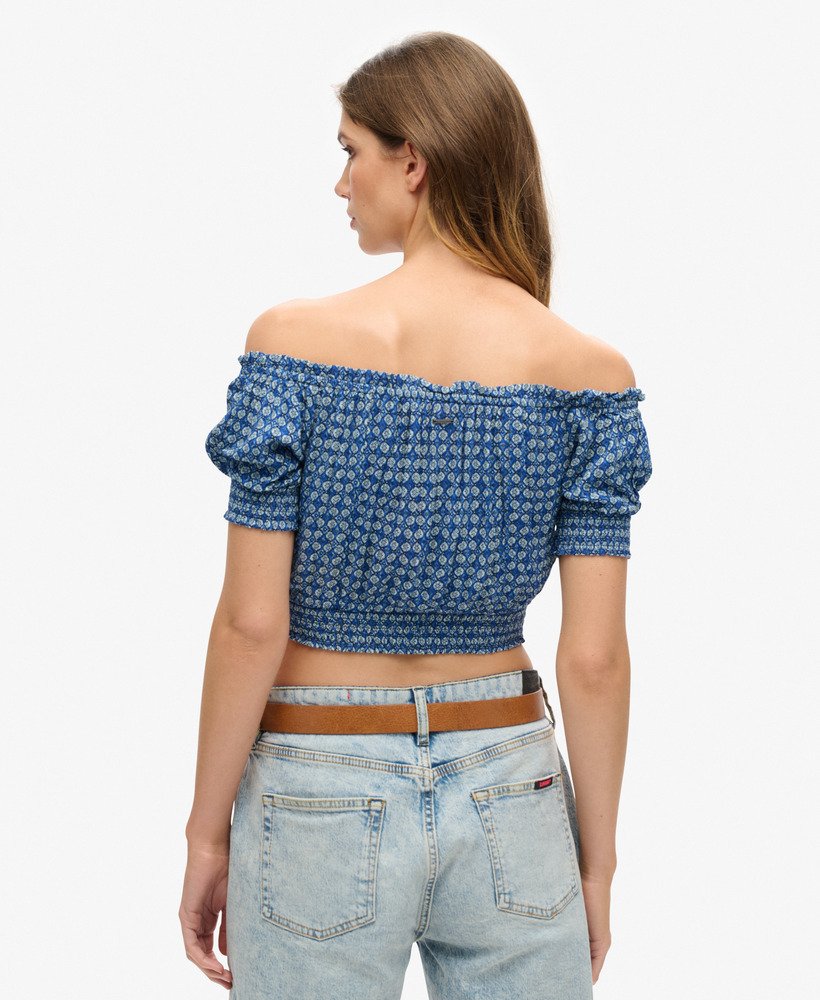 top cropped de manga curta com detalhe franzido em estampa geométrica mini azul.