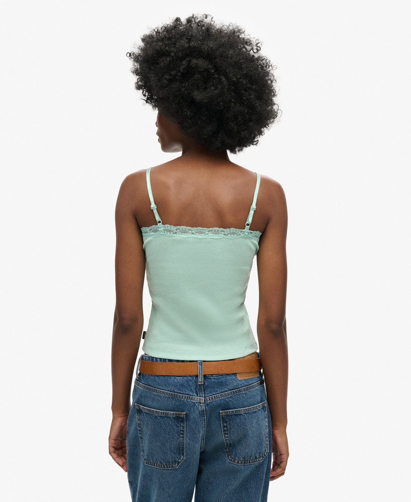 top de alças vintage em algodão orgânico com acabamento em renda canelada na cor verde menta mesclada.