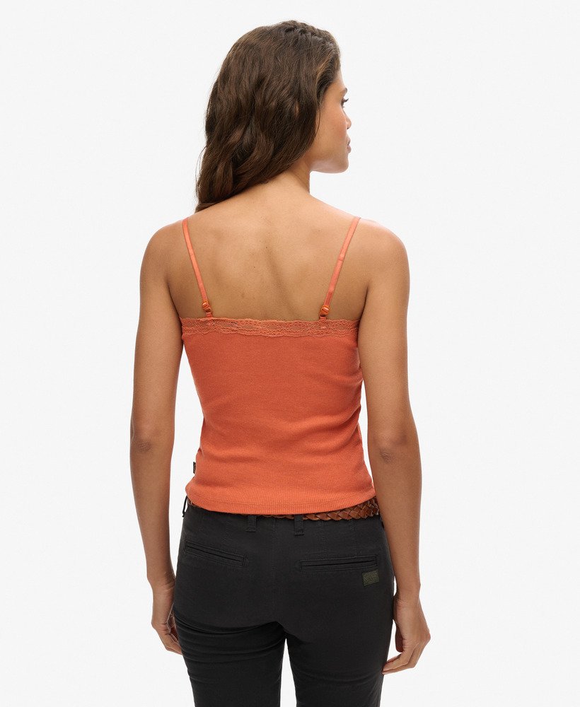 top de alças vintage em algodão orgânico com acabamento em renda canelada na cor laranja ferrugem mesclada.