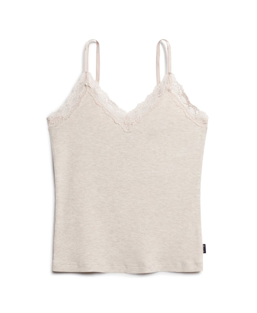 top esportivo básico com detalhes em renda na cor creme mesclado.