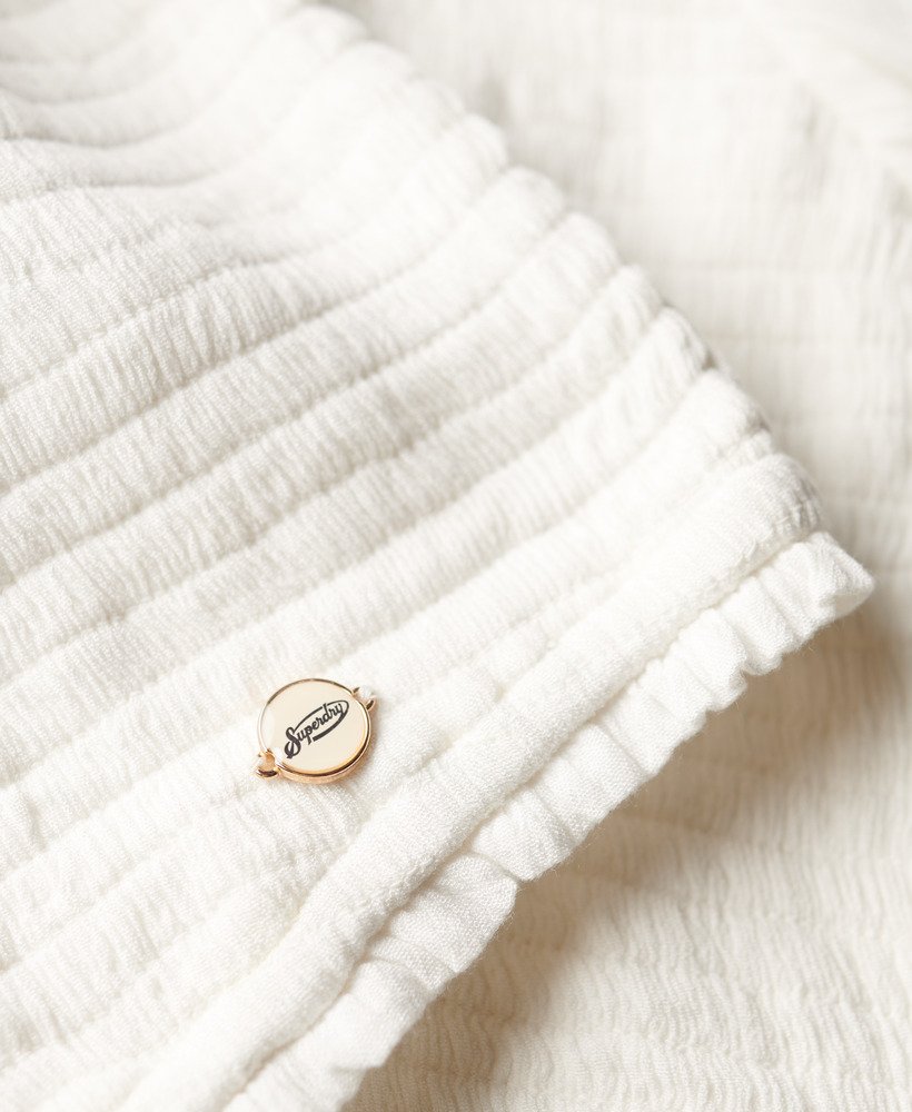 blusa de tecido franzido na cor branco-sujo