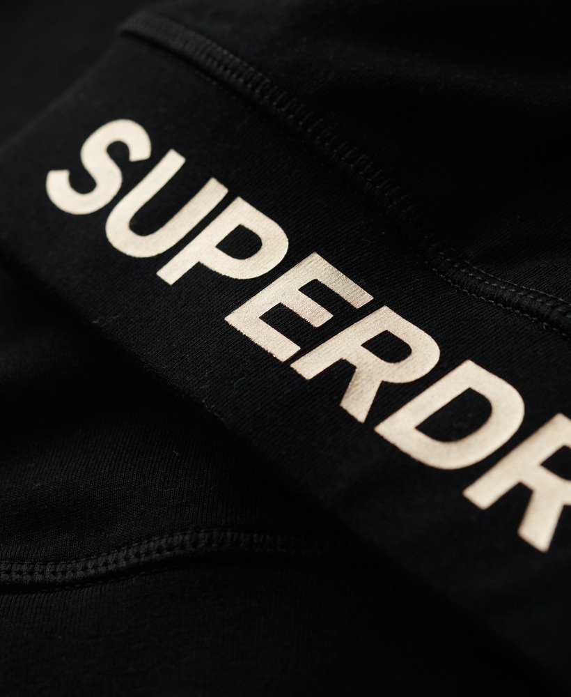 top esportivo com logo na cor pretabronze