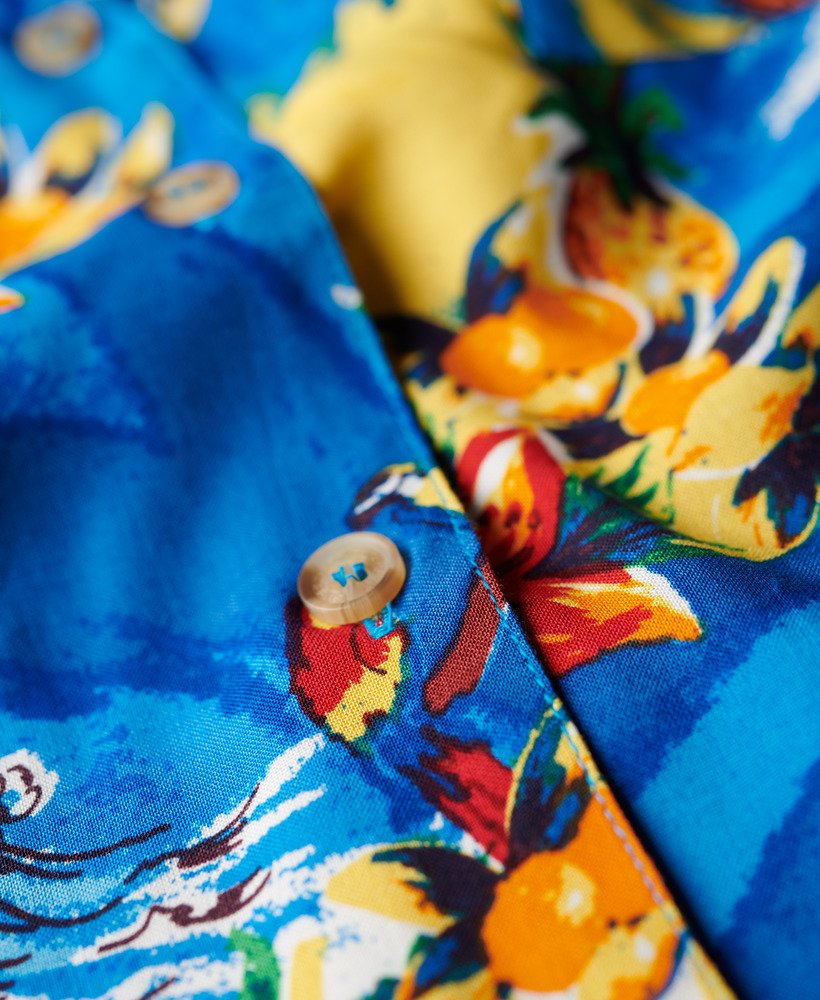 camisa resort de praia em azul golfinho oceano