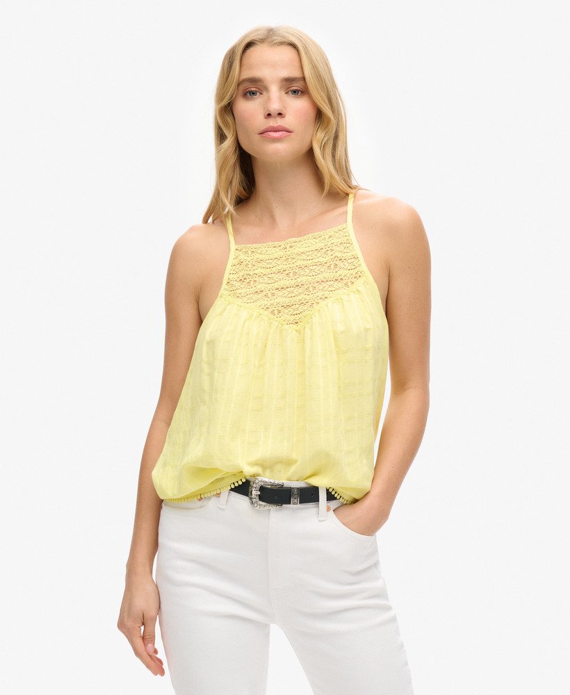 top de renda para praia na cor amarelo claro.