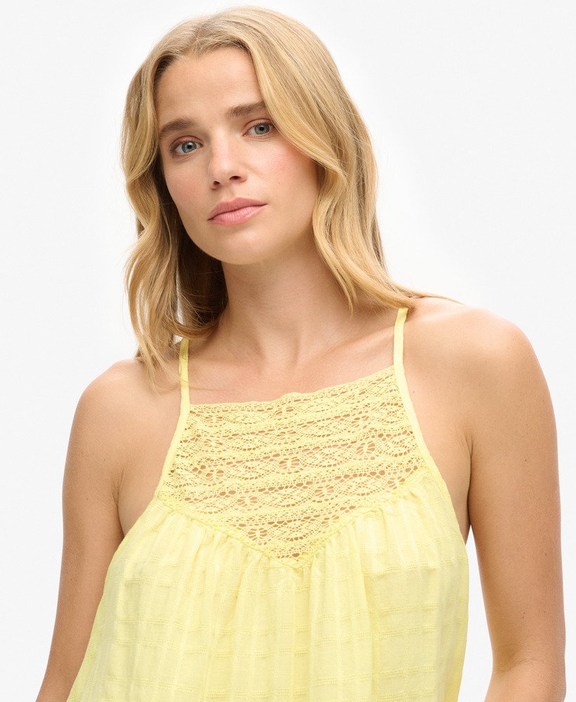 top de renda para praia na cor amarelo claro.