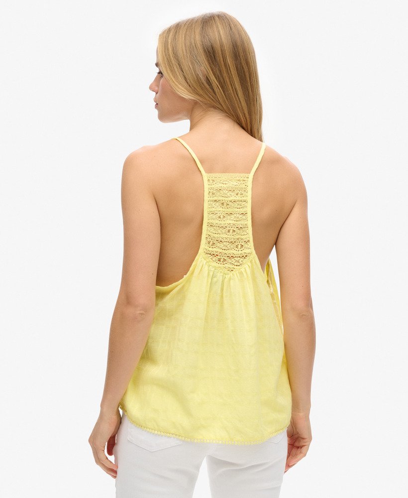 top de renda para praia na cor amarelo claro.