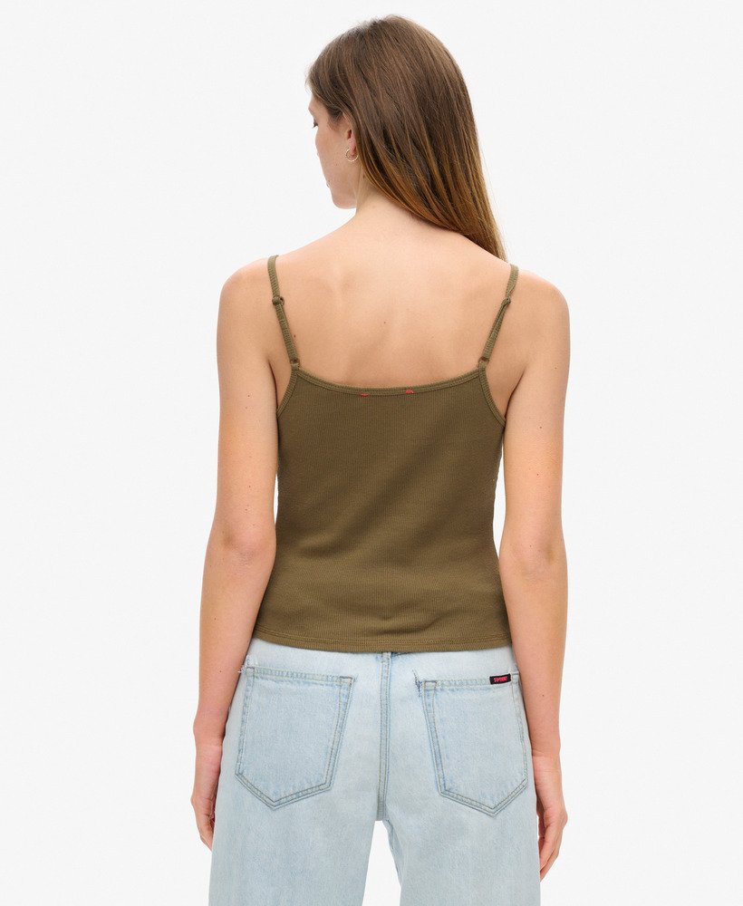 camiseta regata esportiva essencial com estampa de botões na cor verde-escura faia.