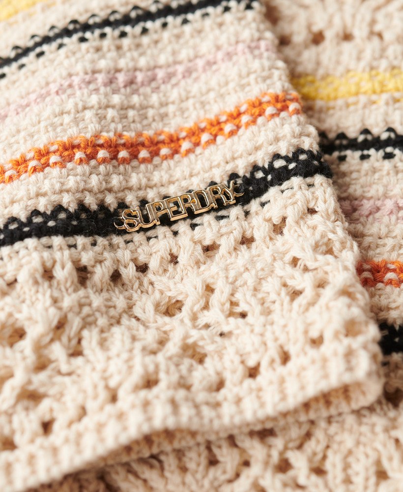 top cropped de crochê com amarração nas costas em mini listras cor creme.