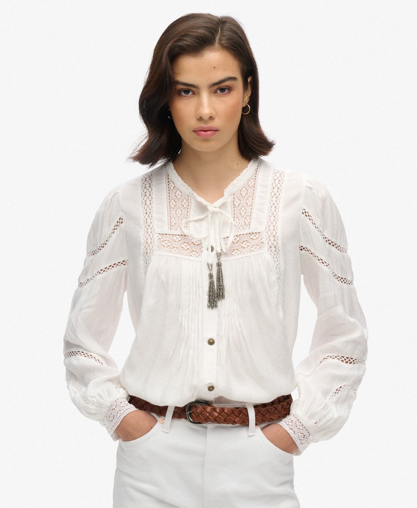 blusa de manga comprida em renda trançada na cor branco off-white.