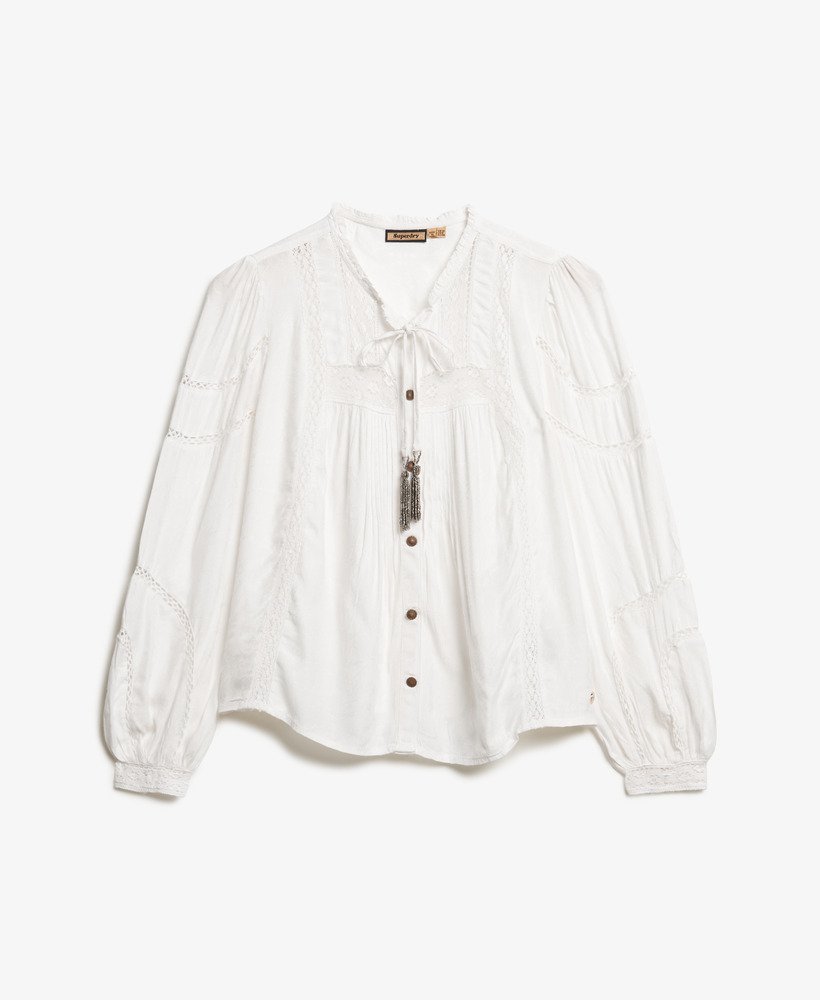 blusa de manga comprida em renda trançada na cor branco off-white.