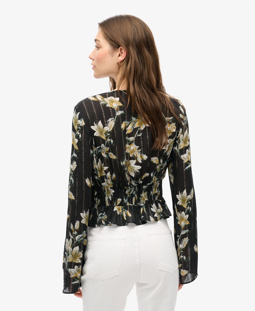 blusa plissada em tecido plano com mangas estilo anos 70 na cor wild lillies