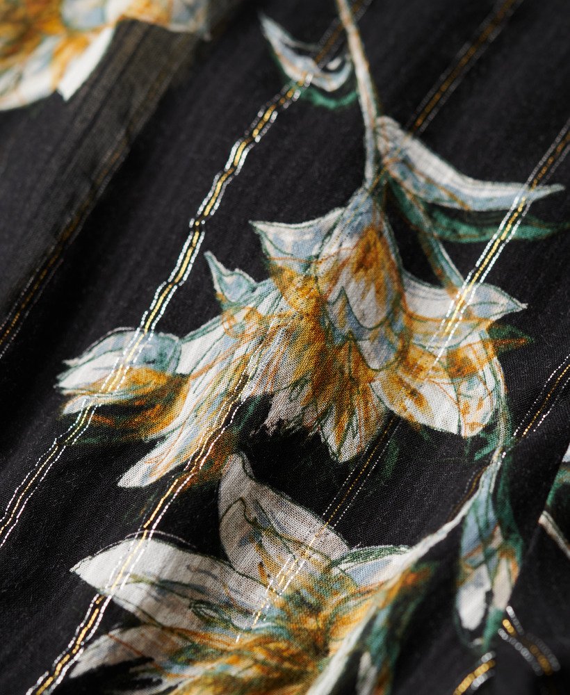 blusa plissada em tecido plano com mangas estilo anos 70 na cor wild lillies