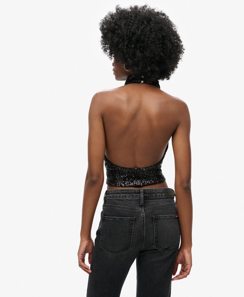 top de lantejoulas com decote halter e drapeado na cor preta lisa.
