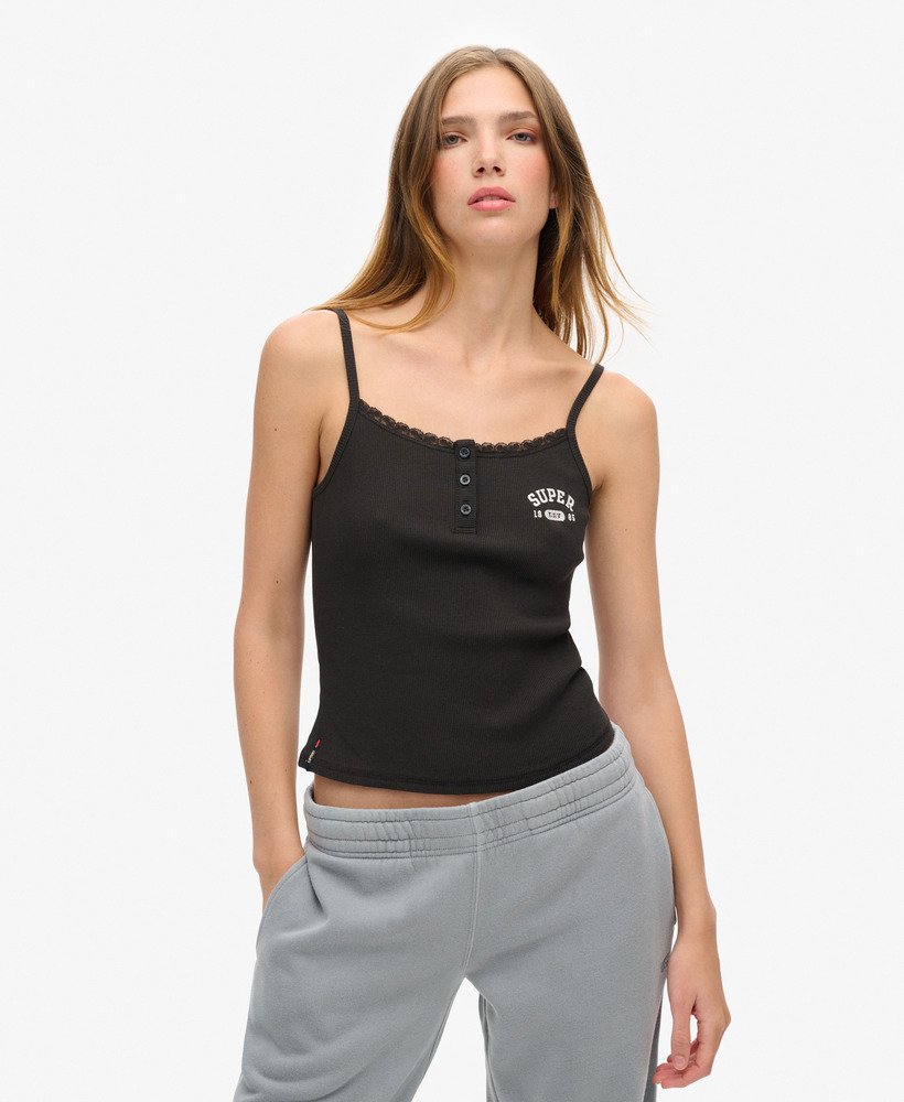 camiseta regata esportiva essencial com estampa de botões na cor bison black.
