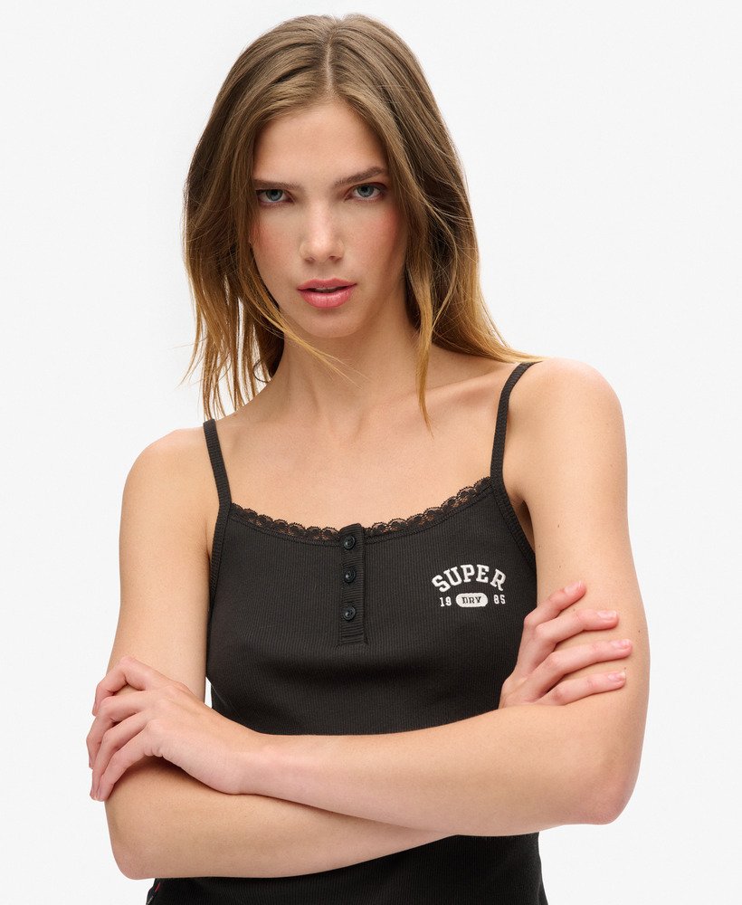 camiseta regata esportiva essencial com estampa de botões na cor bison black.