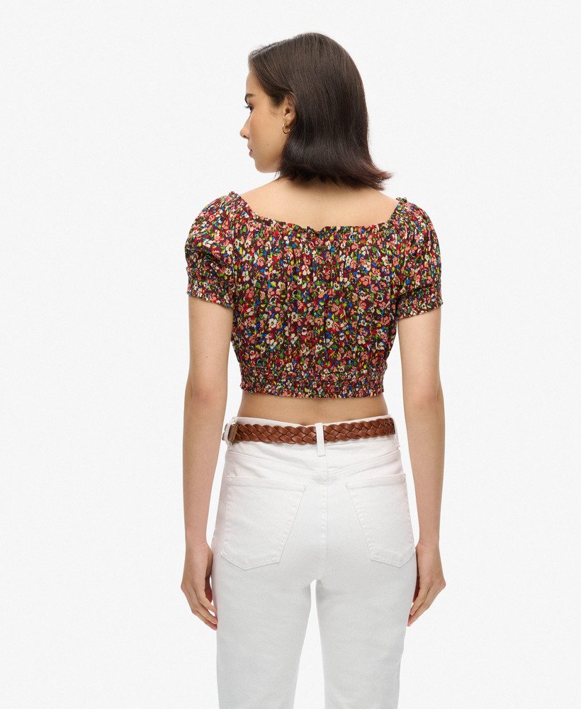top cropped de manga curta com detalhe franzido na estampa betsy ditsy marrom.