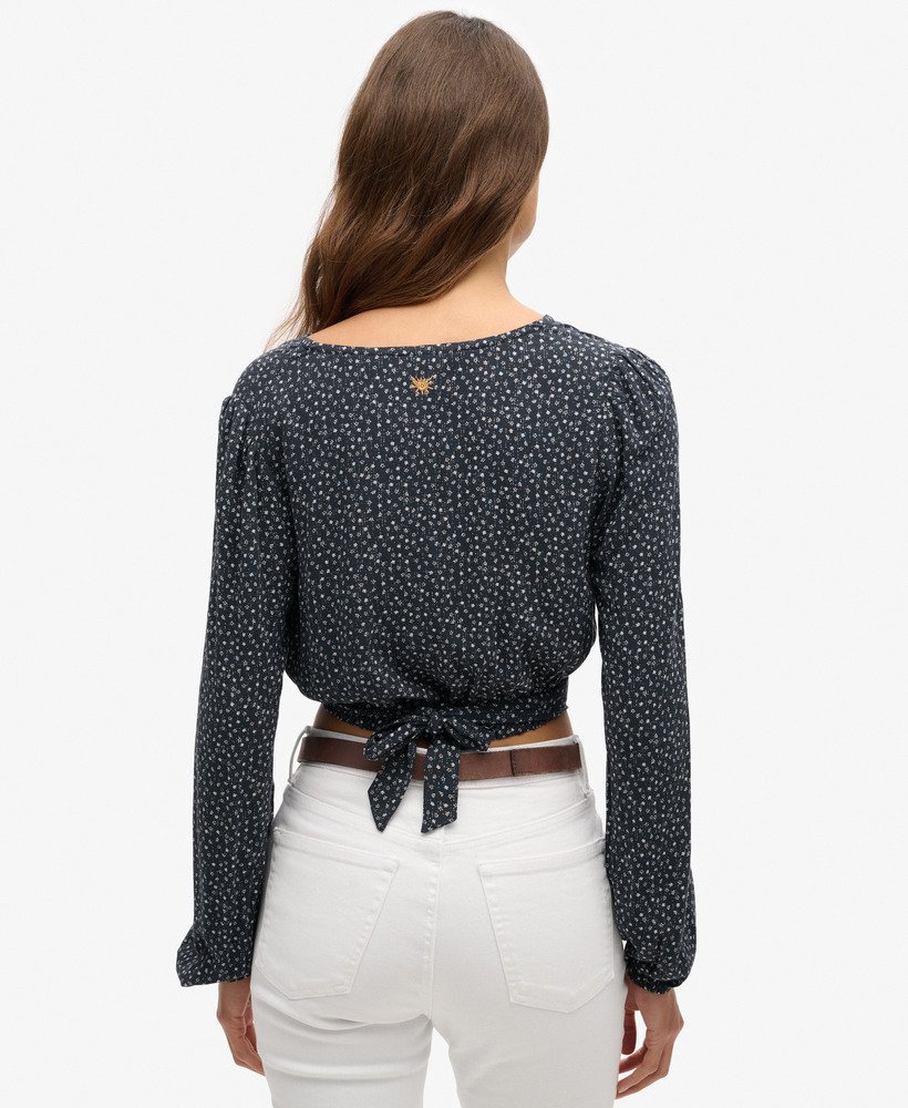 blusa vintage com amarração frontal em estampa floral miúda azul marinho