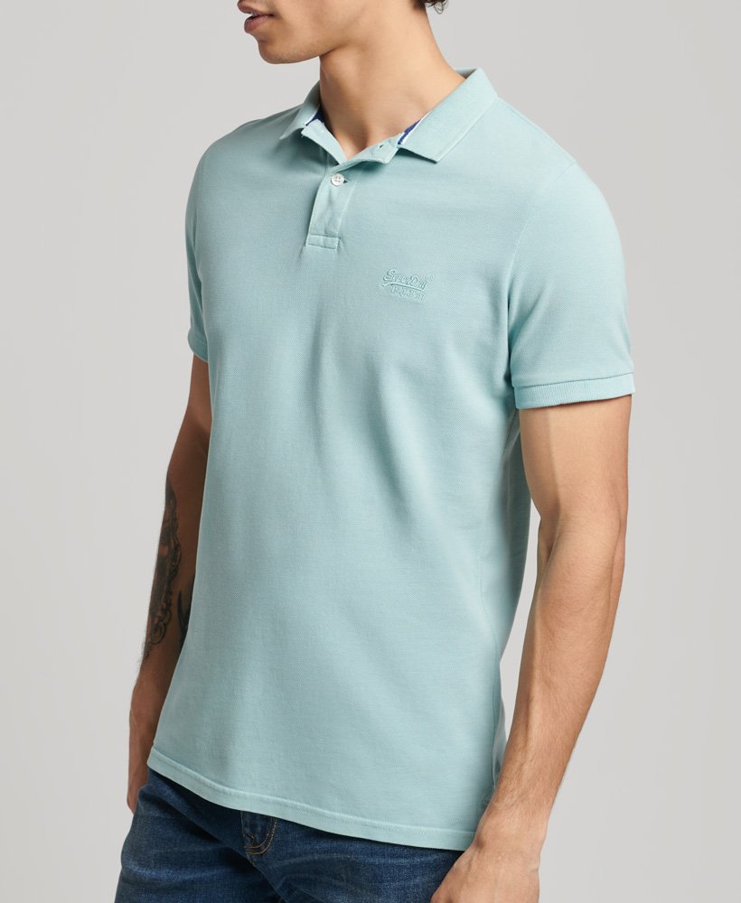 camisa polo vintage destroyed em algodão orgânico na cor menta fresca.