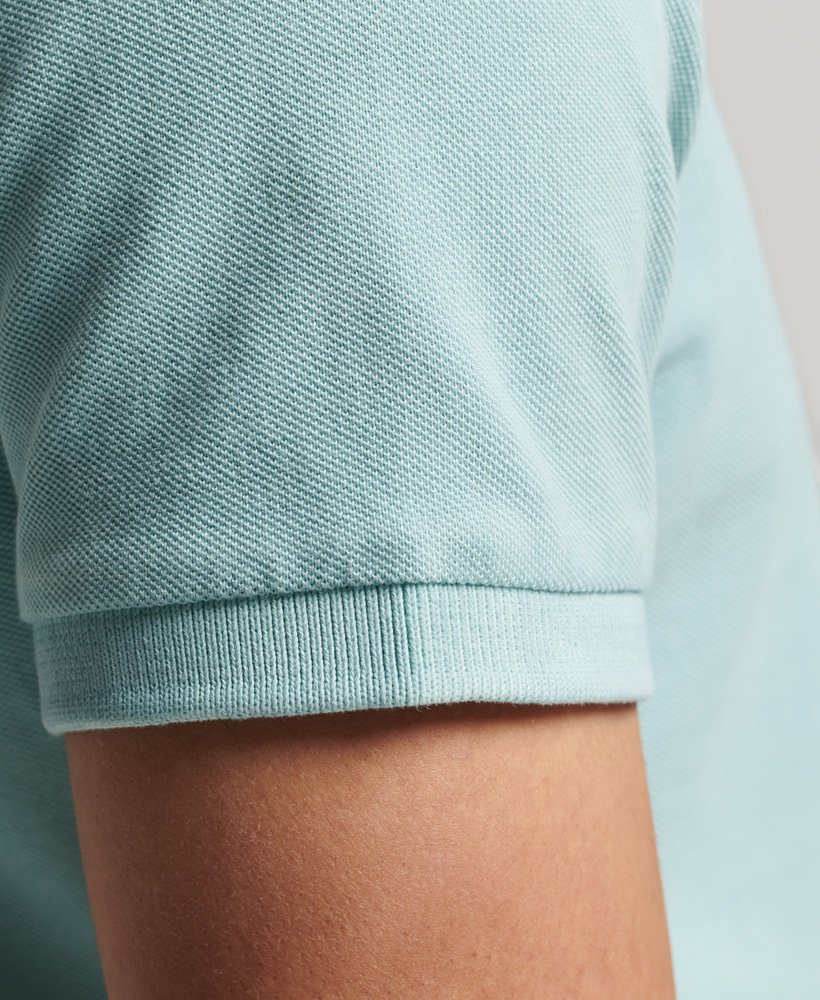 camisa polo vintage destroyed em algodão orgânico na cor menta fresca.