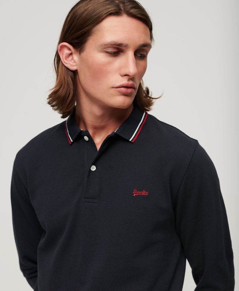 camisa polo vintage de manga comprida com detalhes contrastantes na cor natural.