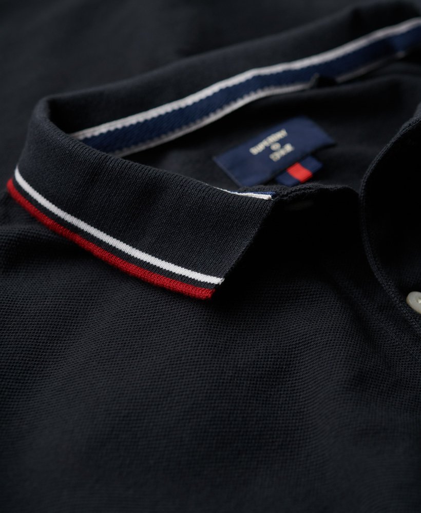 camisa polo vintage de manga comprida com detalhes contrastantes na cor natural.
