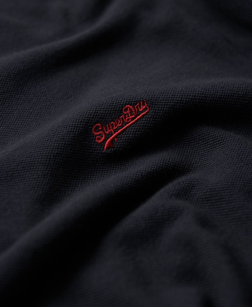 camisa polo vintage de manga comprida com detalhes contrastantes na cor natural.