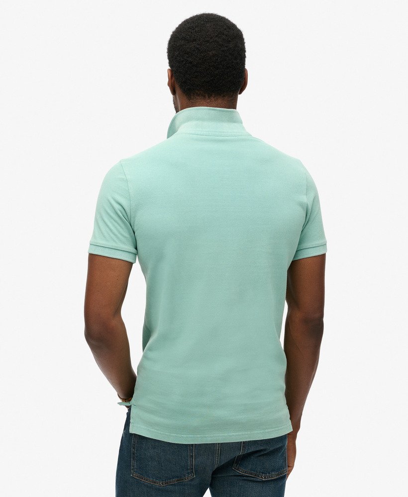 camisa polo destroyed na cor menta fresca.