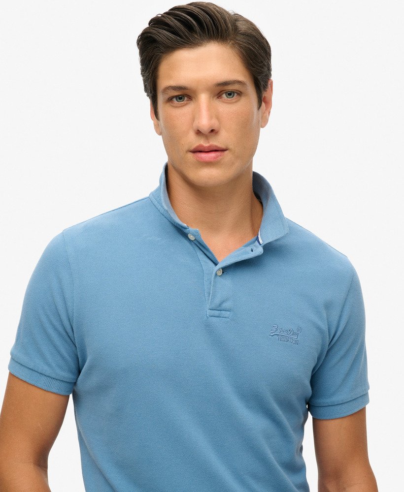 camisa polo desgastada em azul heráldico