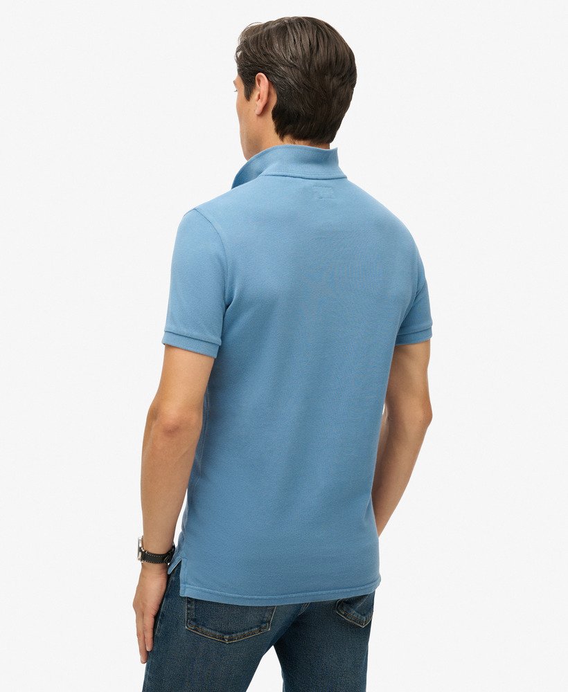 camisa polo desgastada em azul heráldico