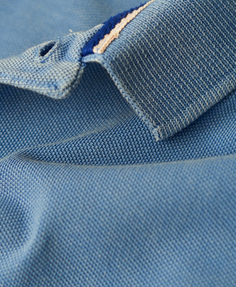 camisa polo desgastada em azul heráldico