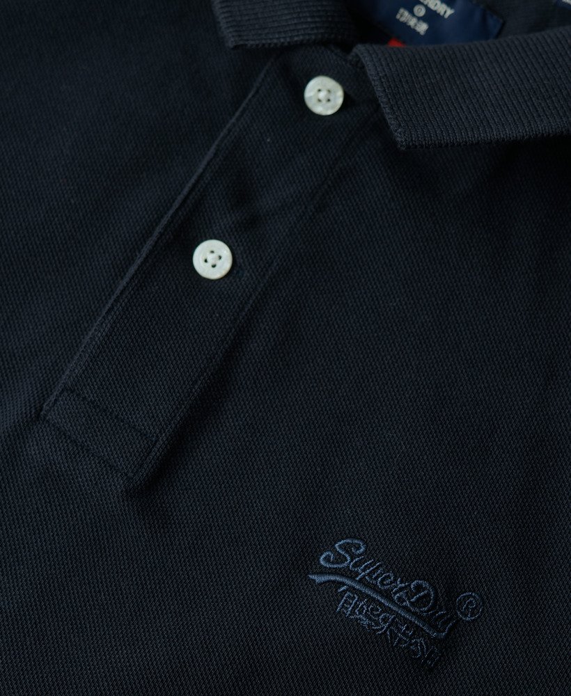 camisa polo clássica em piqué na cor azul-marinho eclipse.