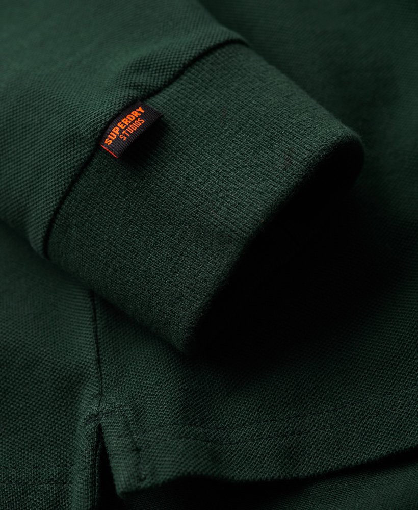 camisa polo de manga comprida em algodão piqué na cor verde-floresta.
