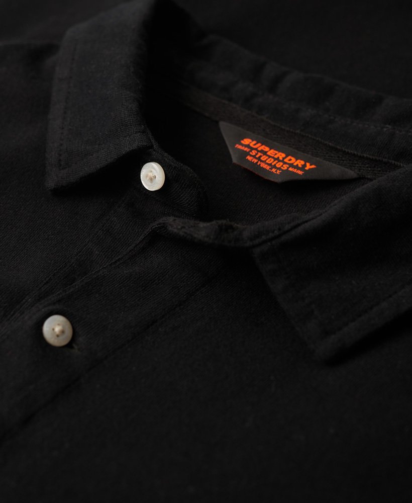 camisa polo de manga comprida studios em jersey na cor preta.