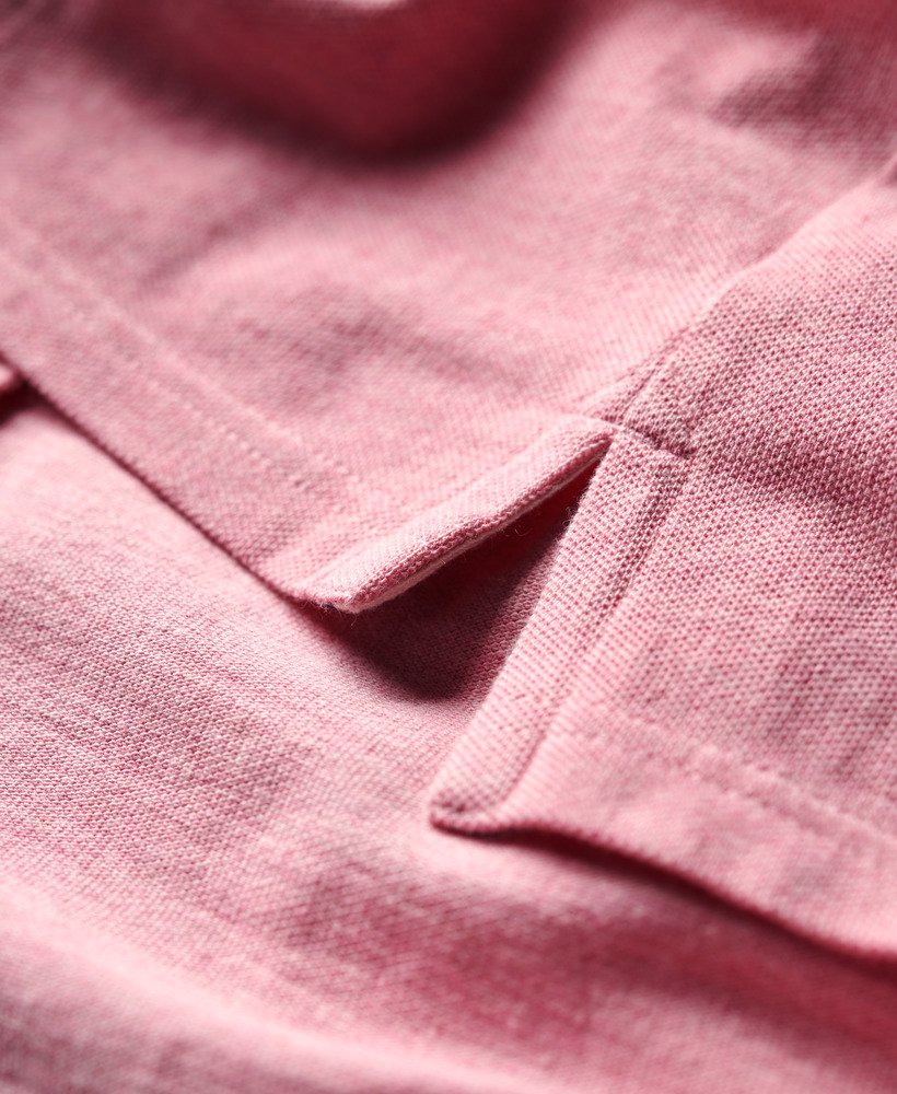 camisa polo clássica em piqué na cor rosa claro mesclado.