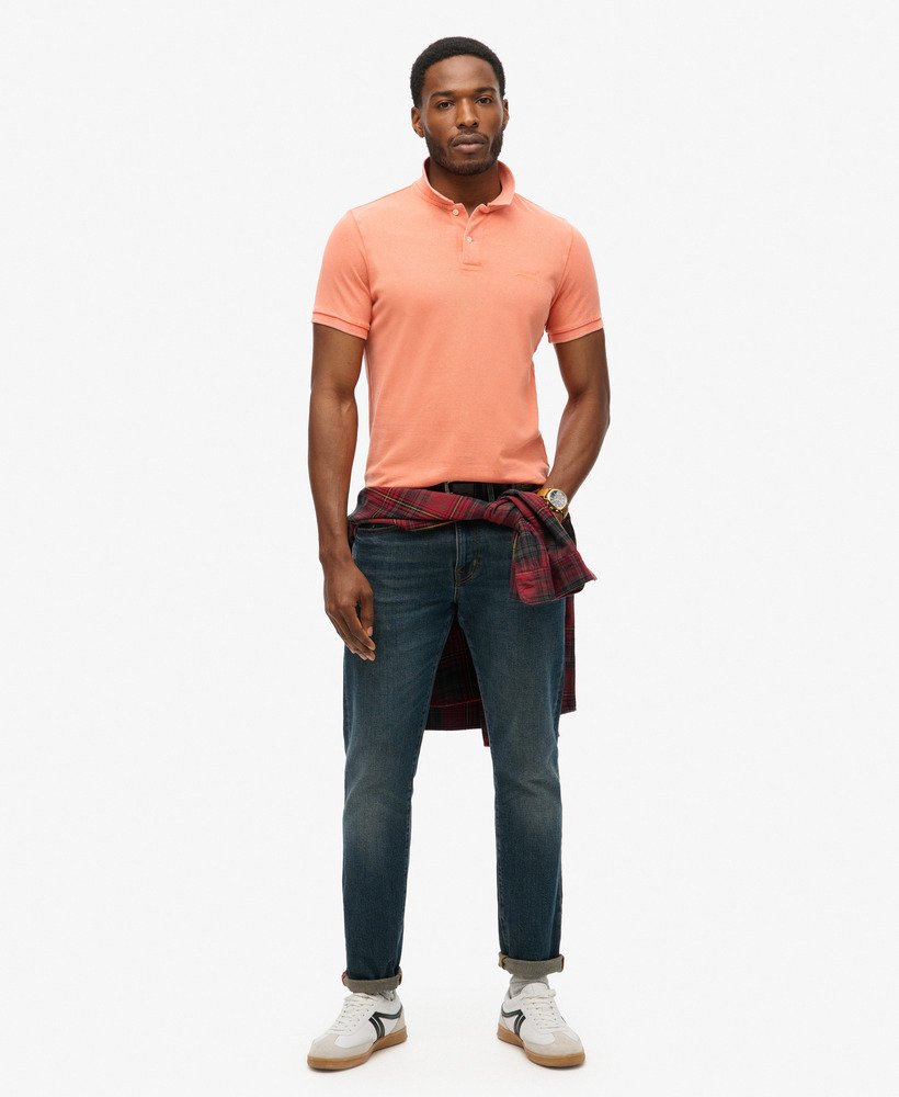 camisa polo destroyed na cor coral sunburst.