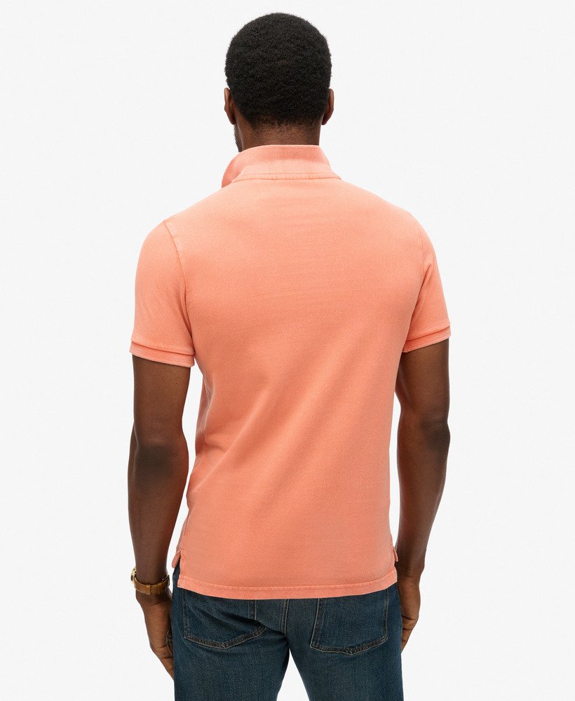 camisa polo destroyed na cor coral sunburst.
