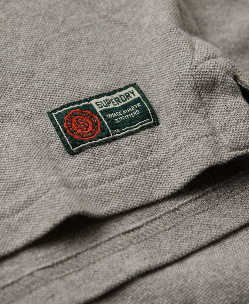 camisa polo esportiva vintage em cinza mescla claro