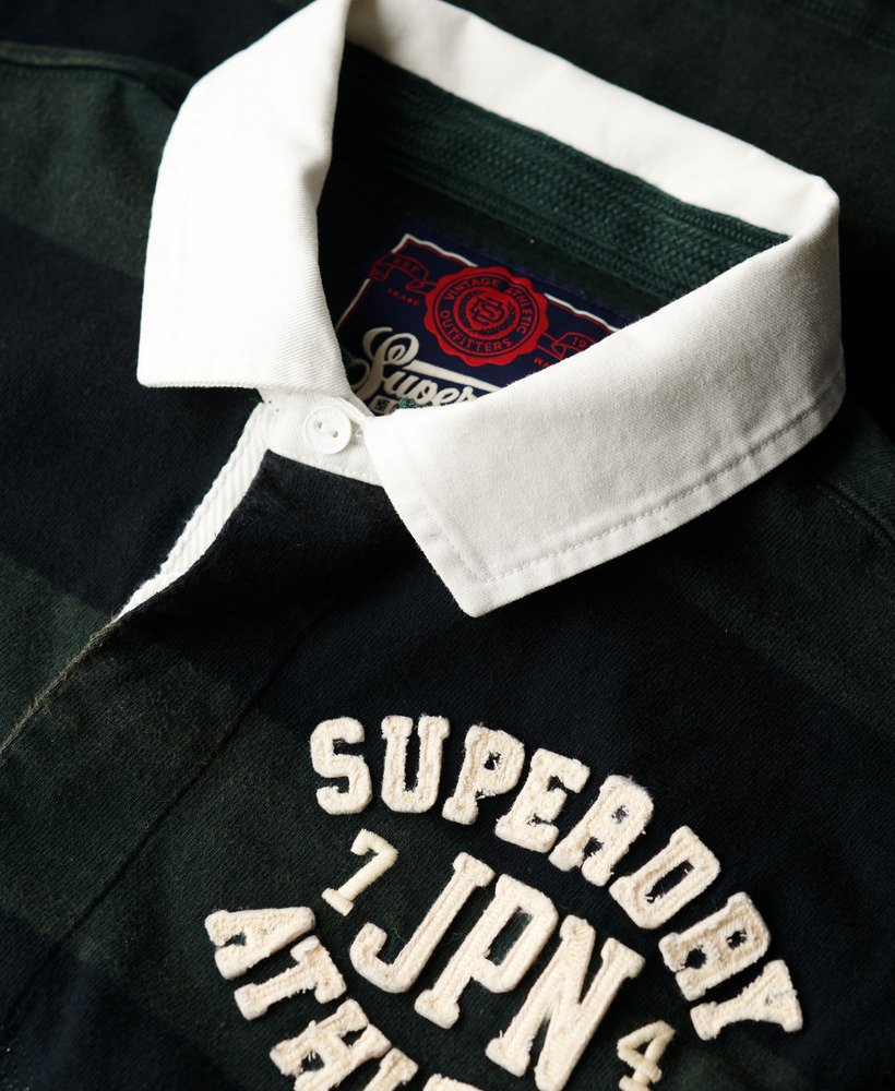 camisa de rugby esportiva em verde escuropreto lavado