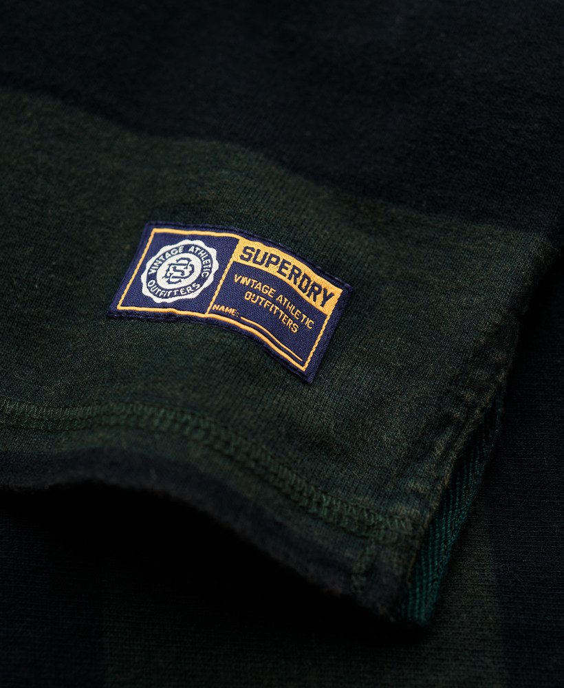 camisa de rugby esportiva em verde escuropreto lavado