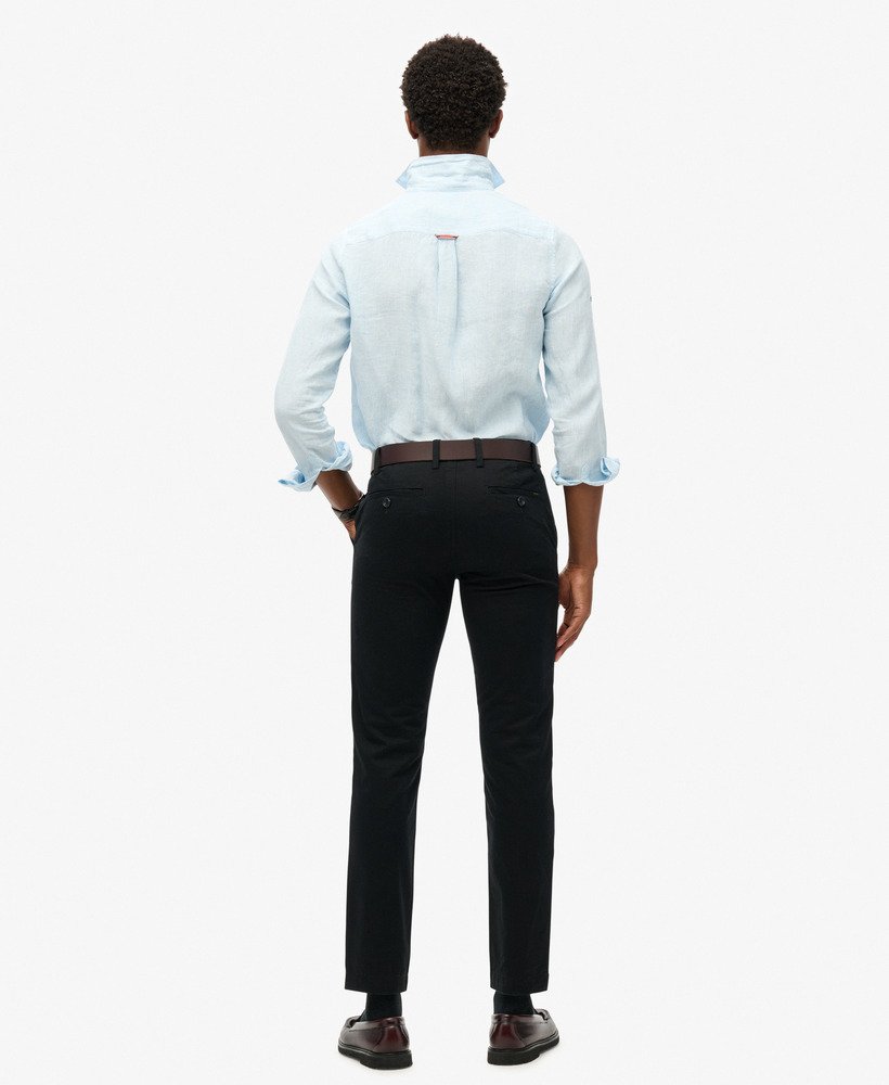 calça chino slim tapered stretch na cor preta.