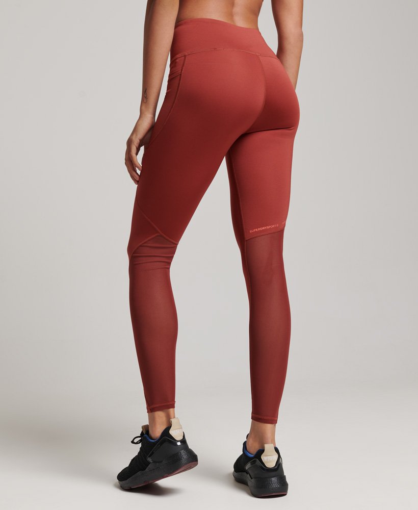 calça legging active mesh full length tight na cor marrom tijolo.