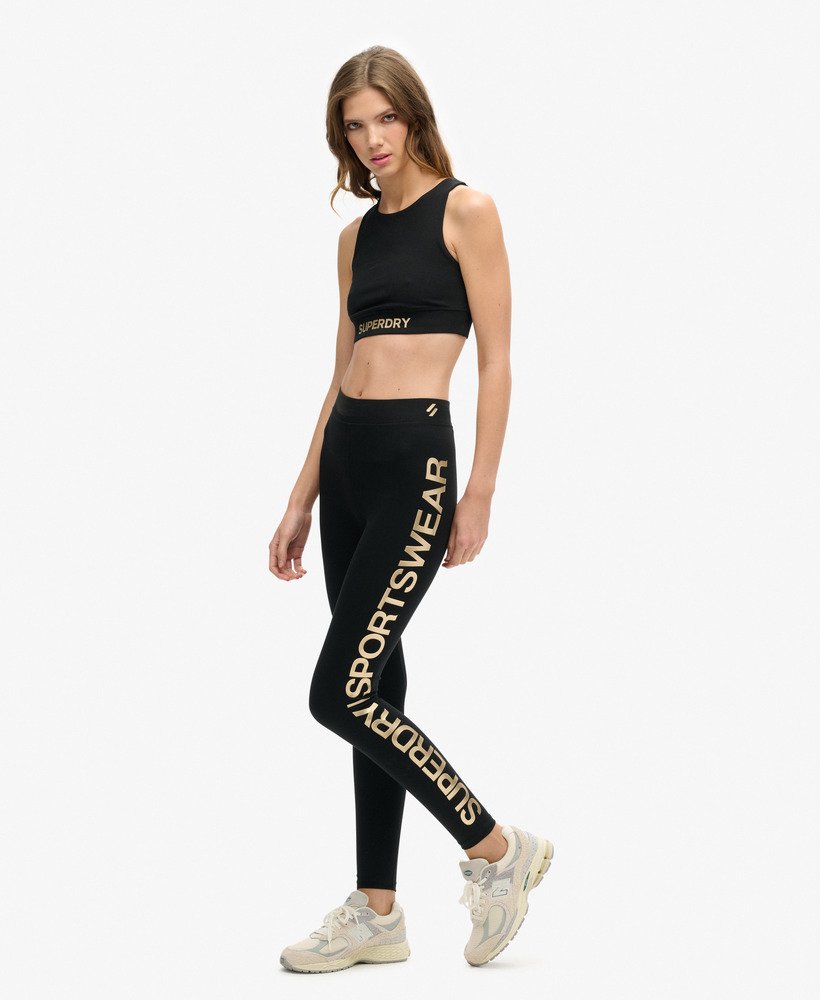 calça legging esportiva de cintura alta em pretobronze