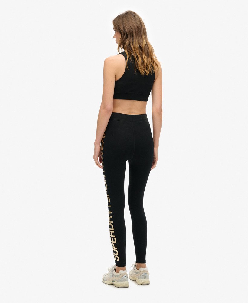 calça legging esportiva de cintura alta em pretobronze