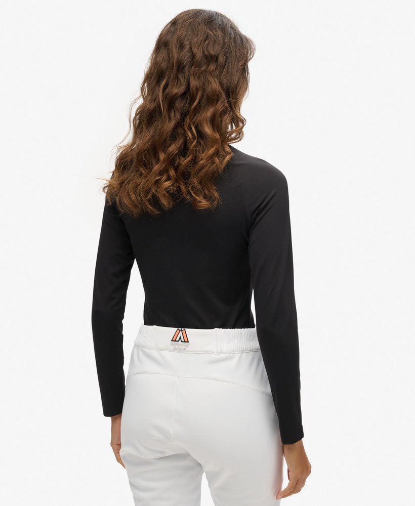 camiseta térmica ski logo com meio zíper na cor preta.