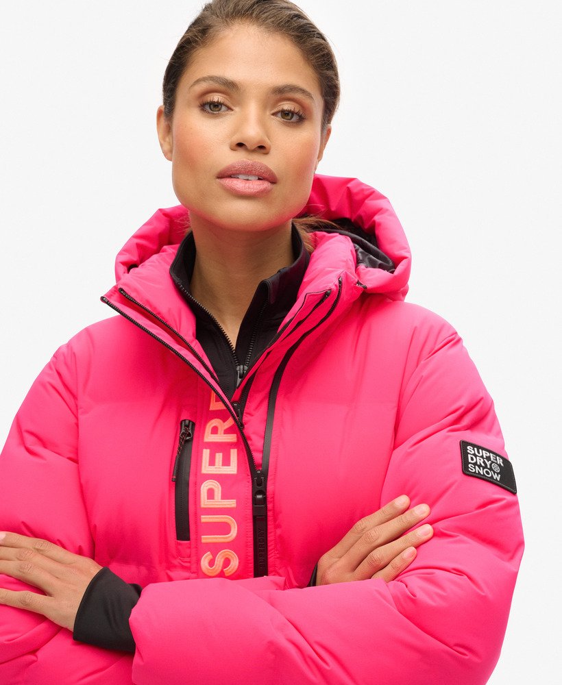 jaqueta puffer boxy com capuz para esqui na cor rosa hiper fire.