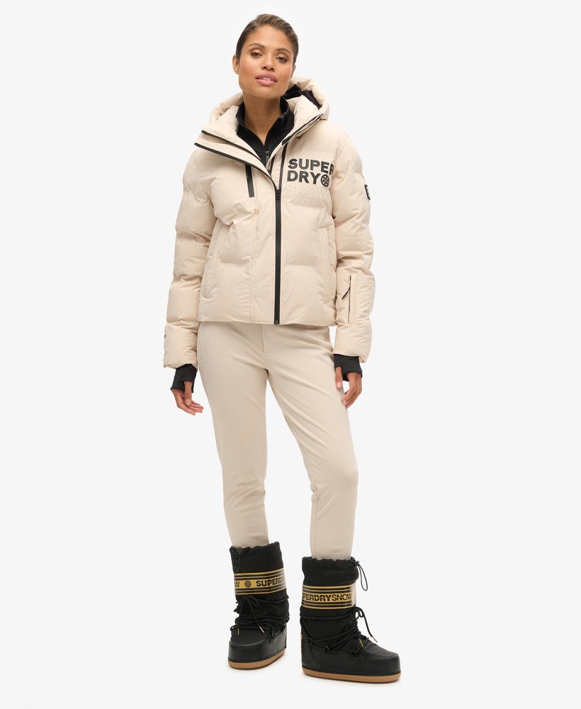 jaqueta puffer boxy com capuz para esqui na cor cinza off-shade.