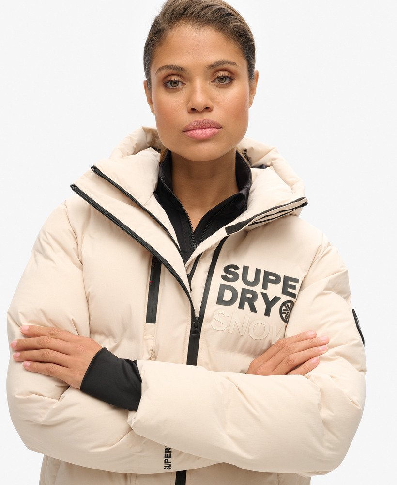 jaqueta puffer boxy com capuz para esqui na cor cinza off-shade.