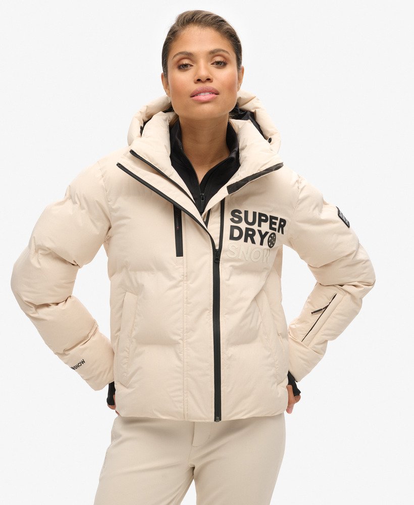 jaqueta puffer boxy com capuz para esqui na cor cinza off-shade.