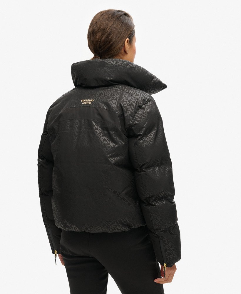 jaqueta puffer ski slalom em superdry monogram black luxe